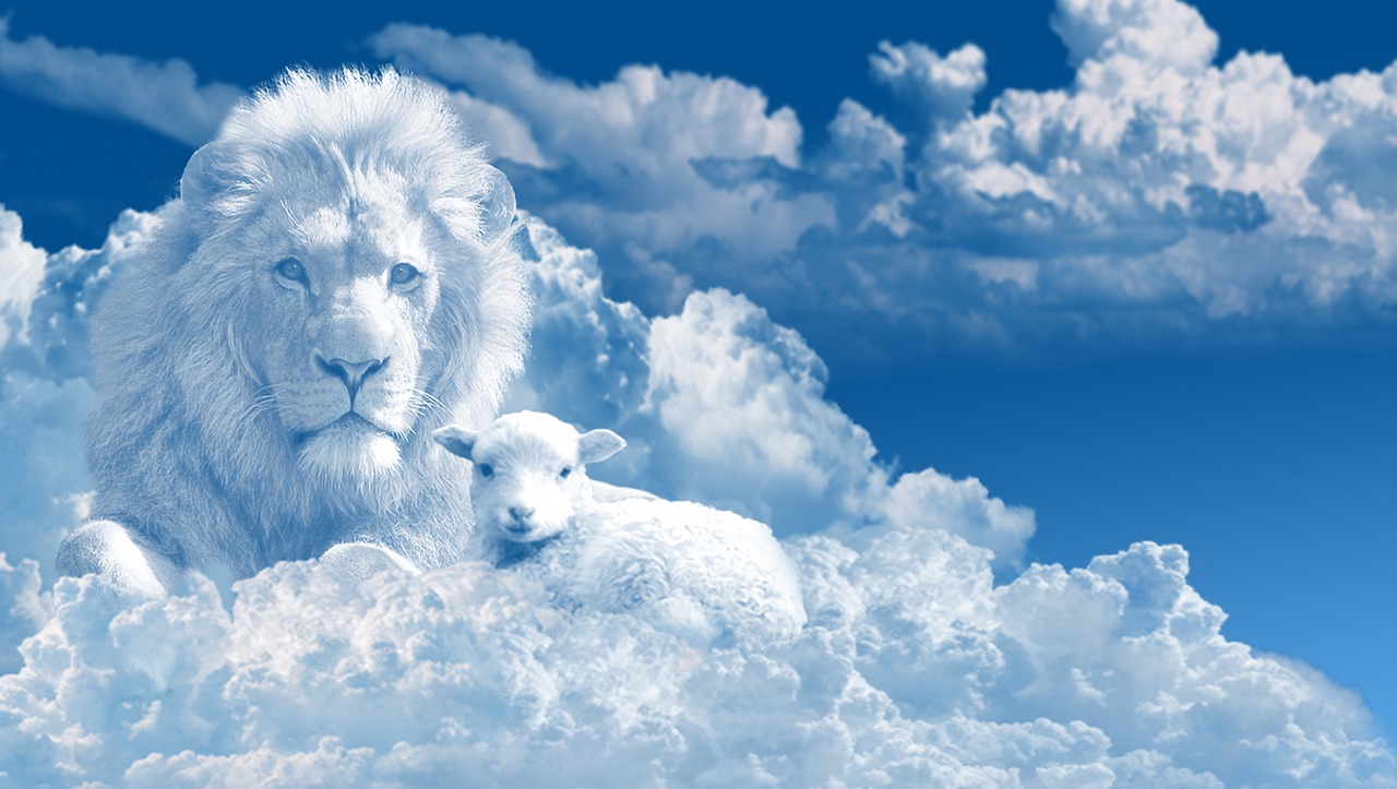 Blue sky with a lion and lamb in the clouds
