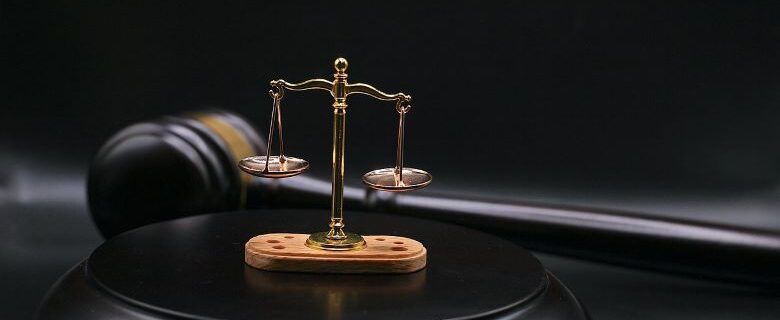 Scales of Justice with a judge mallet